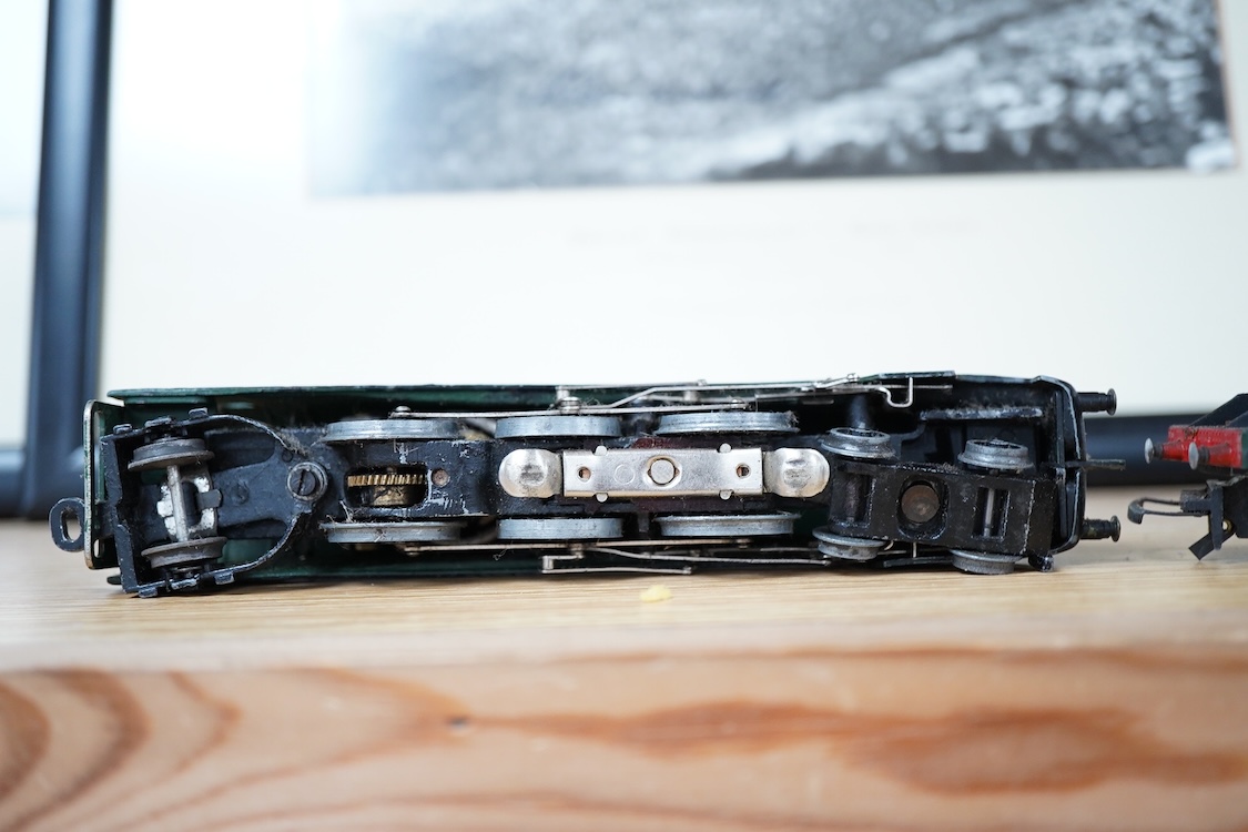 Three part-built 0 gauge railway brass and white metal locomotives by John Worsley; an ACE Products kit of an SR Bullied light Pacific with its original box, a SECR Wainwright H class 0-4-4T locomotive and an LNER class